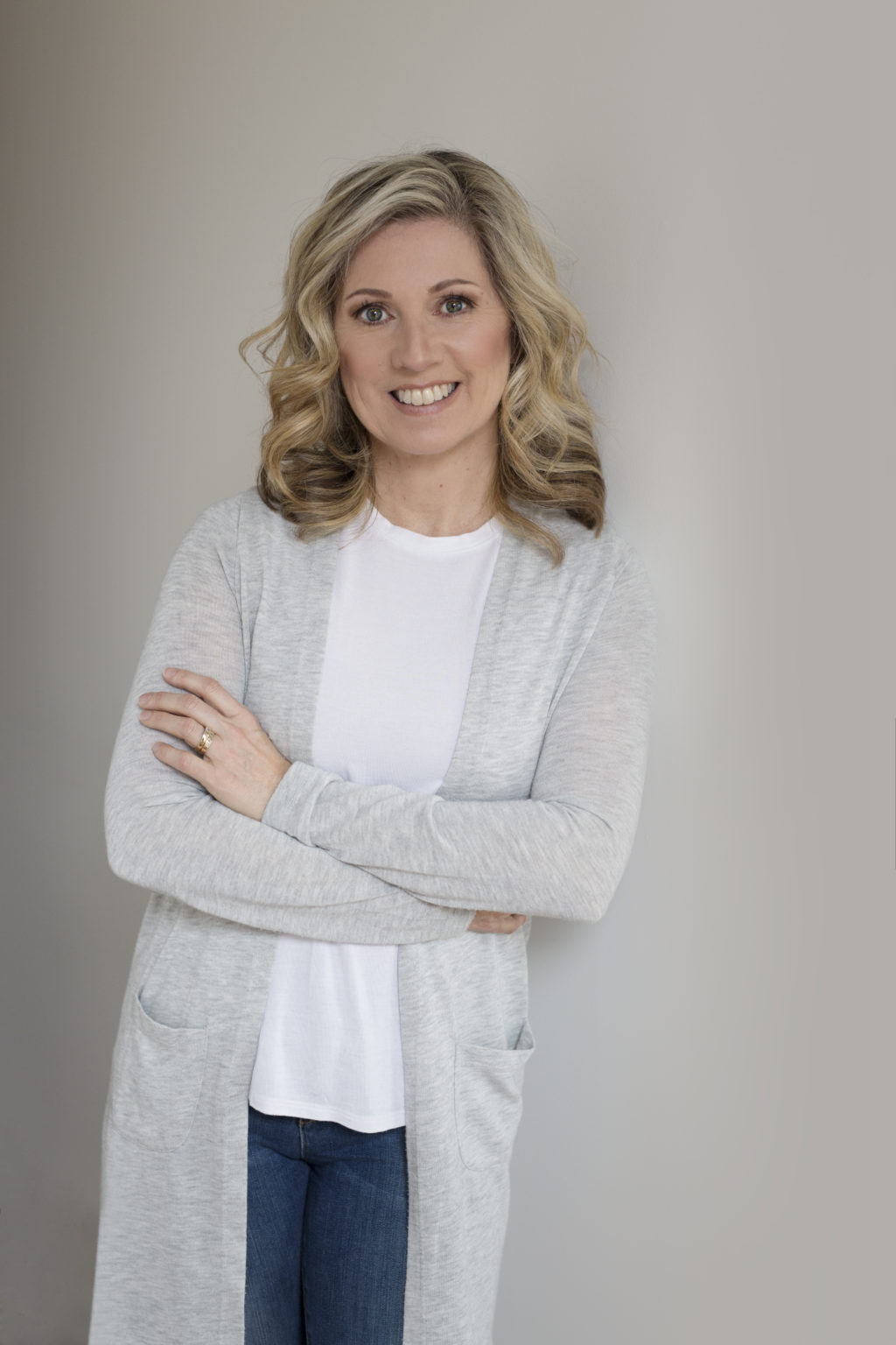 umlah leaning against wall